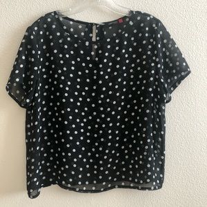 Black and white polka dotted blouse